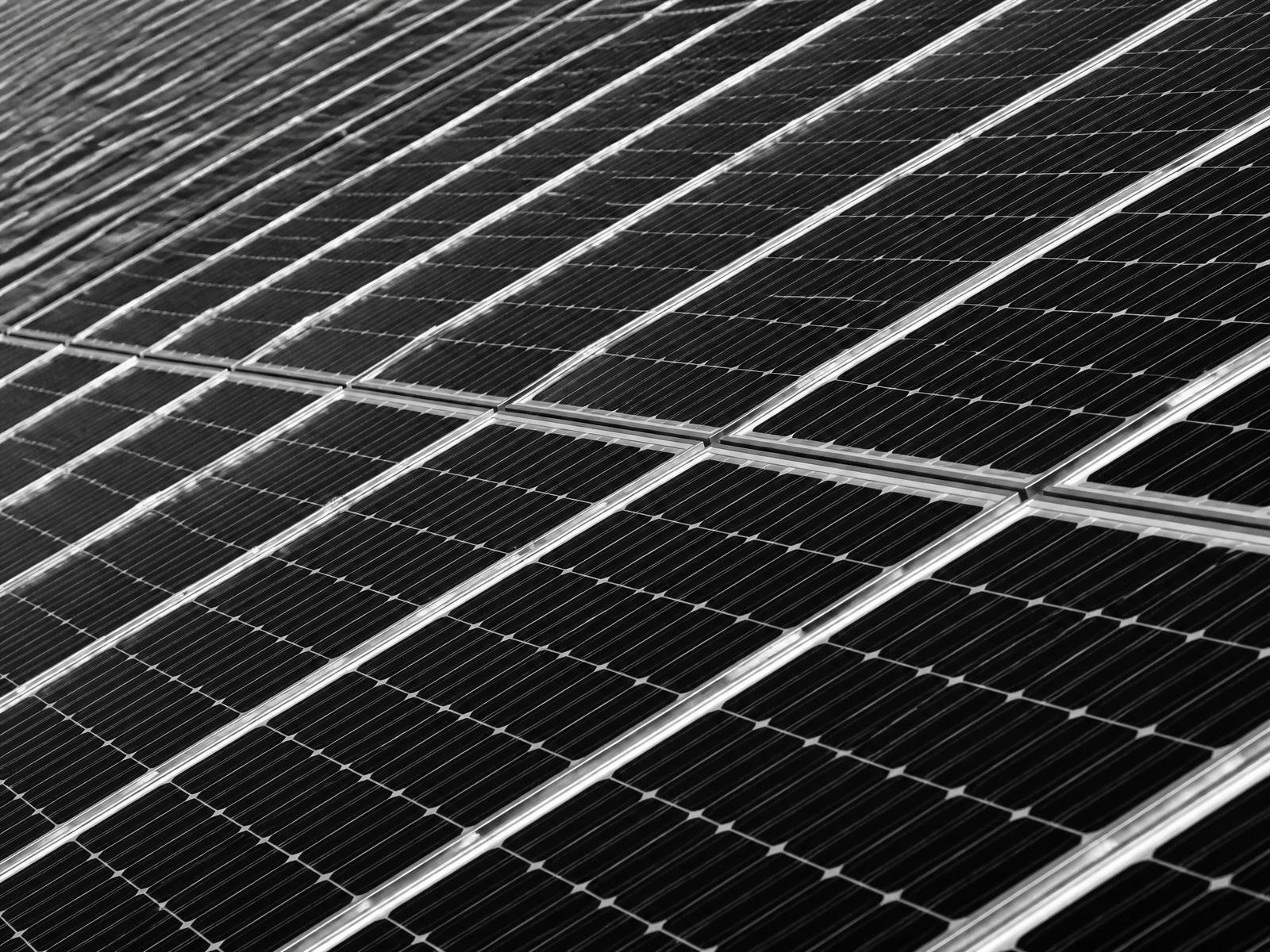 Monochrome geometric pattern of a solar panel array